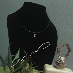 New, Handmade Necklace With Clear String and 14-10k Gold Charm and Close Piece